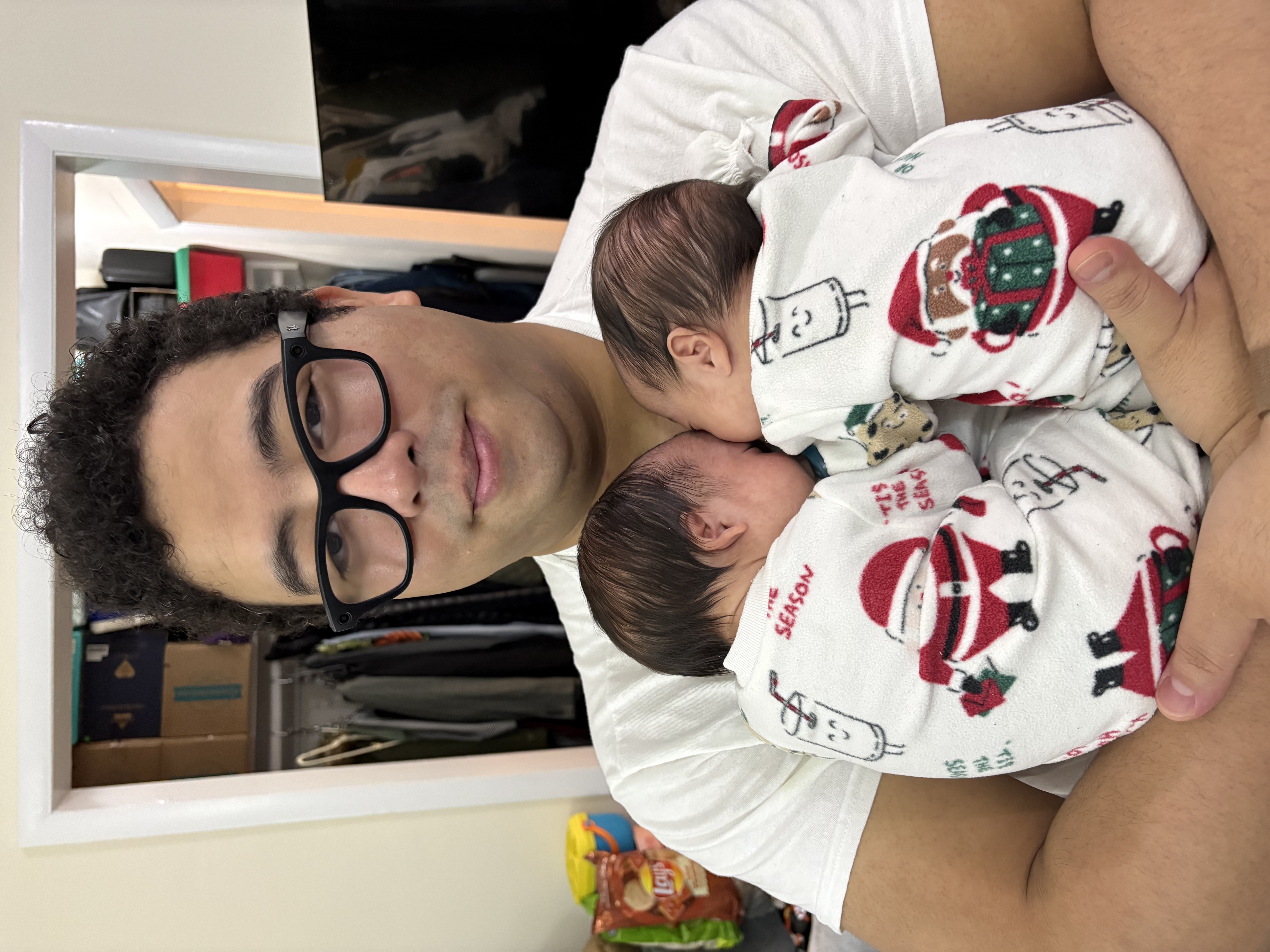 David holding his twin babies
