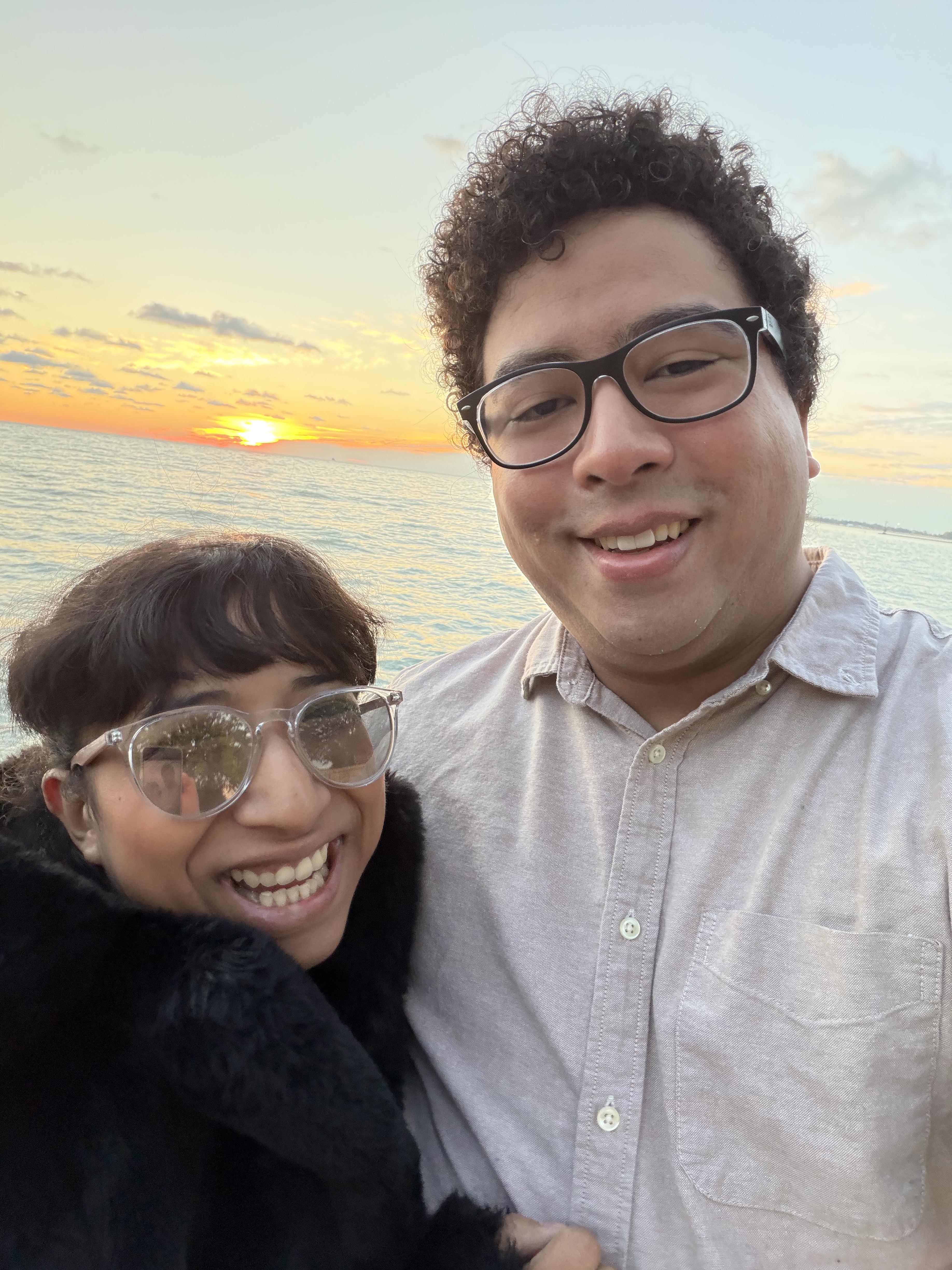 David and his wife by the lake at sunset